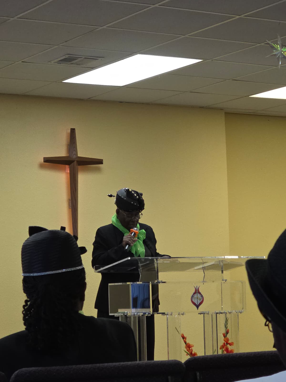 A church speaker at the lectern